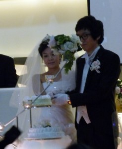 Sammy and J.R. cut their cake