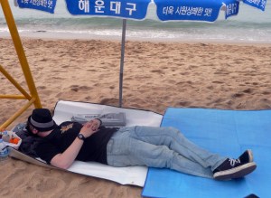 carey_napping_on_the_beach